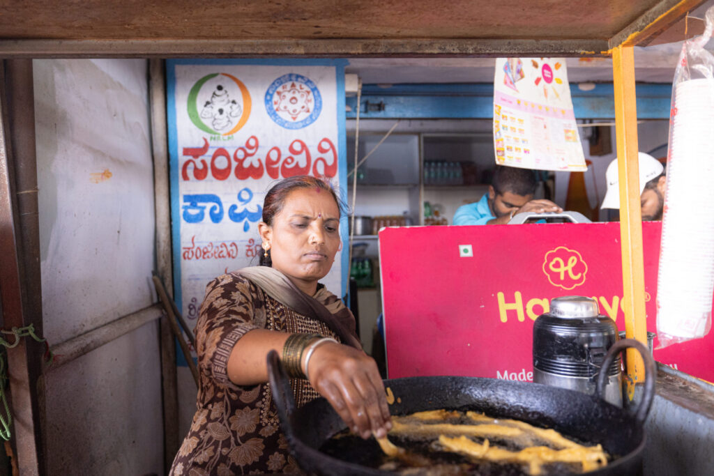 Usha Devi cooks at her family's small restaurant